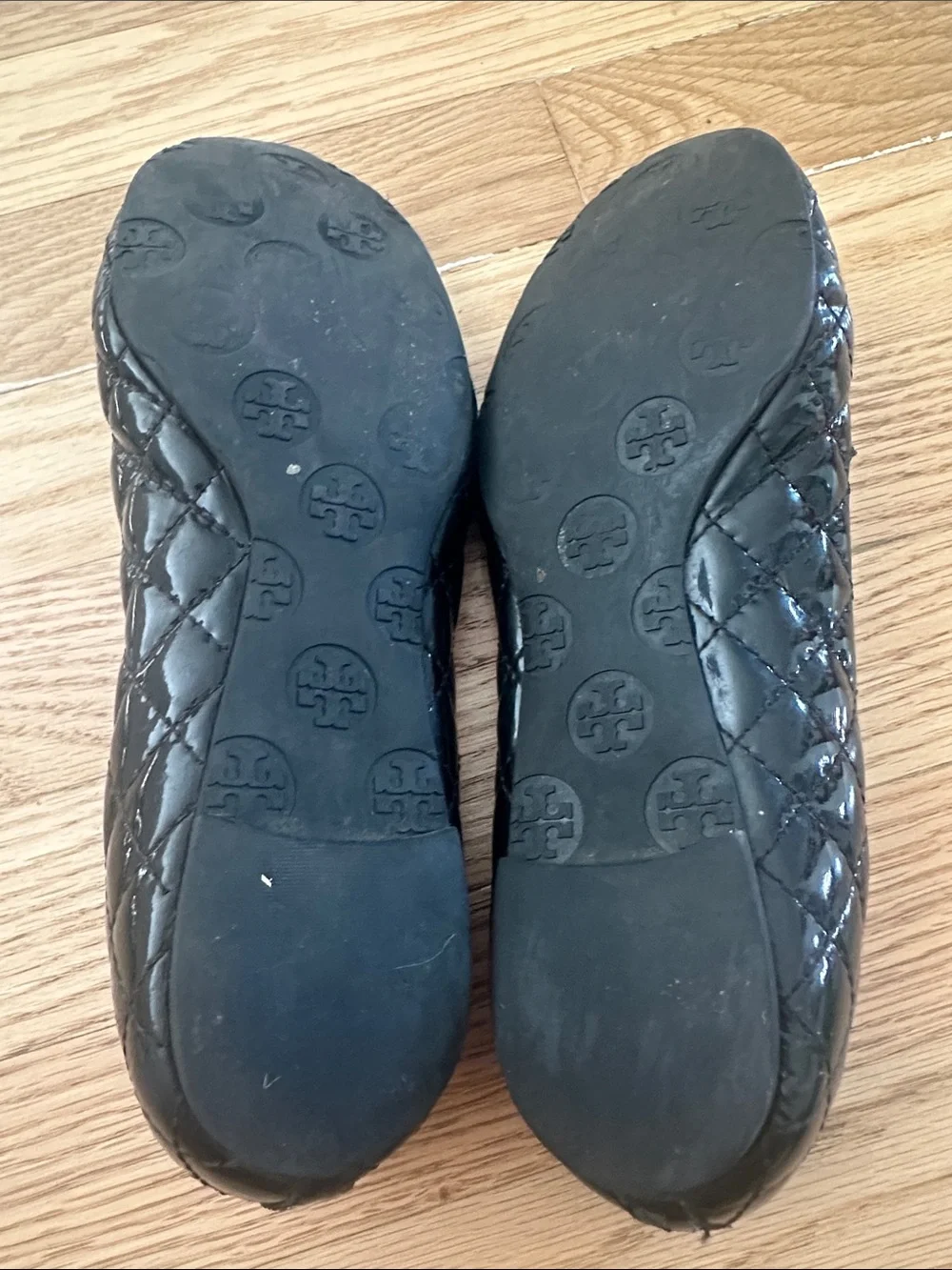 Tory Burch Black Quilted Logo Round-Toe Flats with Gold Emblem